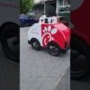 The adorable Chic-fil-A automated delivery carriage Delivers your order to you - miles away
